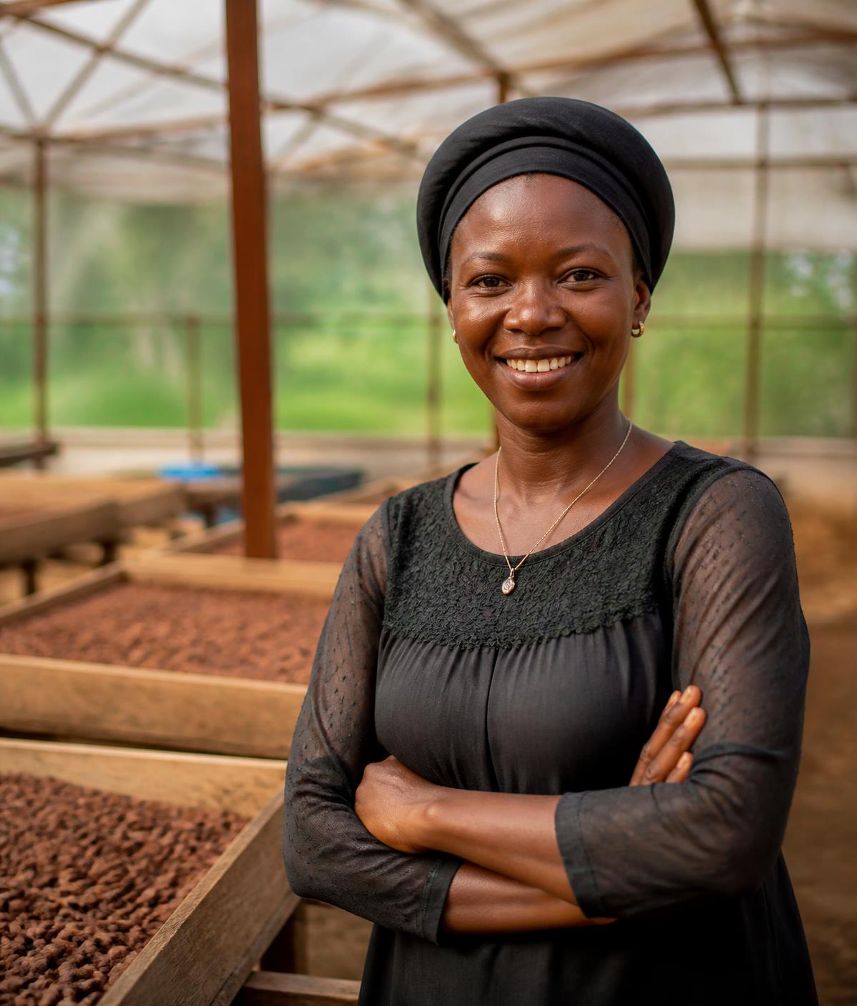 A woman entrepreneur standing in her agricultural processing business